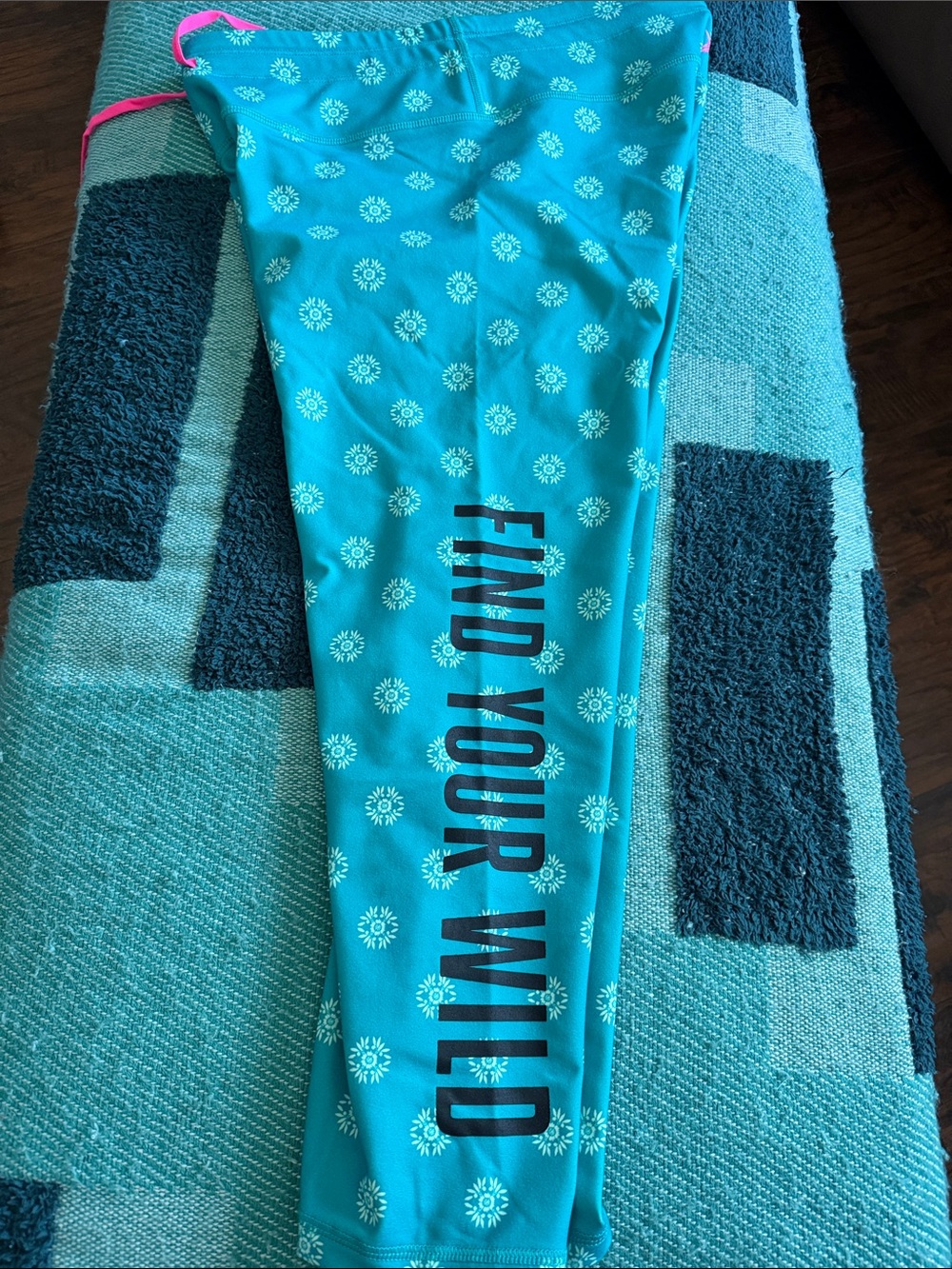 Woman’s Turquoise capri leggings with 'Find Your Wild' Print
